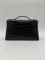 Hermès Kelly Pochette Black Matte PHW K